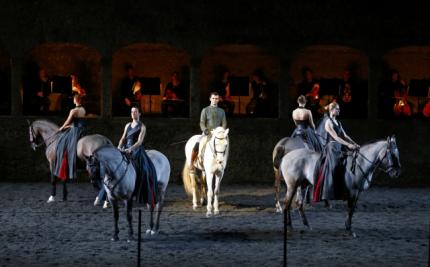 Horses and riders perform on stage during a dress rehearsal of Wolfgang Amadeus Mozart's cantata "Davide penitente" in Salzburg