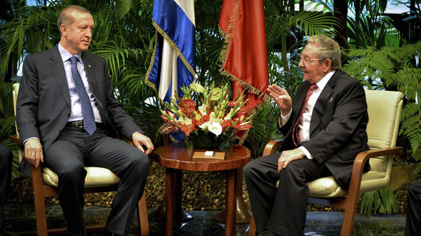 Recep Tayyip Erdogan talks to Raul Castro during a meeting in Havana's Revolution Palace
